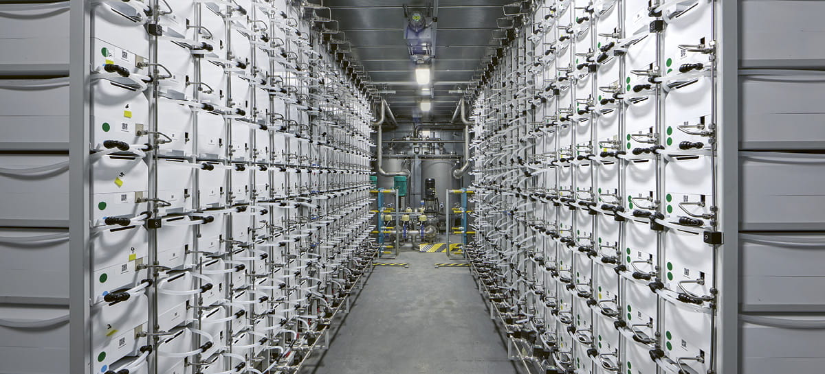 A hallway between containers. 